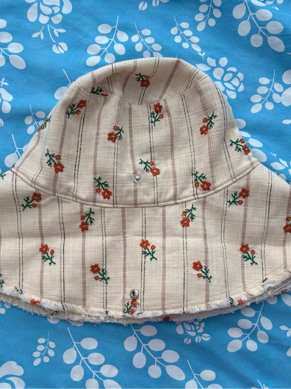 Zara Cream Bucket Hat with Orange Floral Embroidery